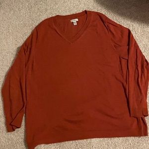 Burnt orange long sleeve sweater.